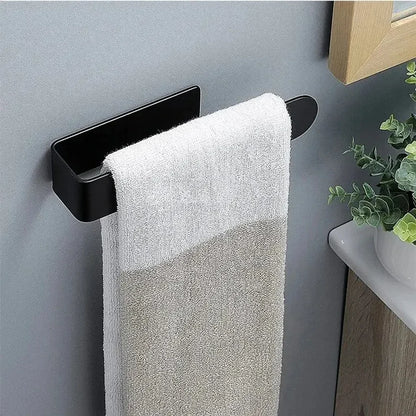 Barre porte serviette installé dans une salle de bain