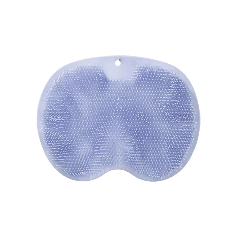 Tapis exfoliant silicone antidérapant posé au sol de salle de bain humide