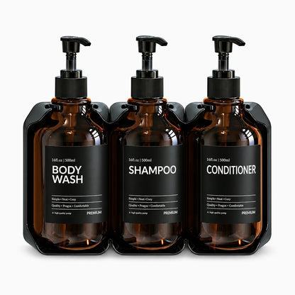 Trois conteneurs de produits de soin alignés sur distributeur mural de salle de bain
