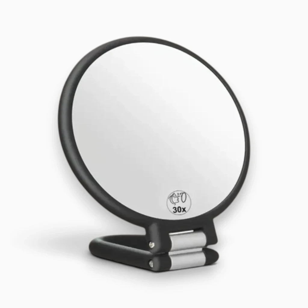 Miroir grossissant de voyage double face sur son support pliable