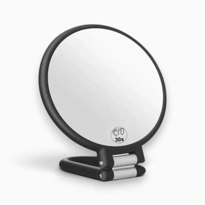 Miroir grossissant de voyage double face sur son support pliable