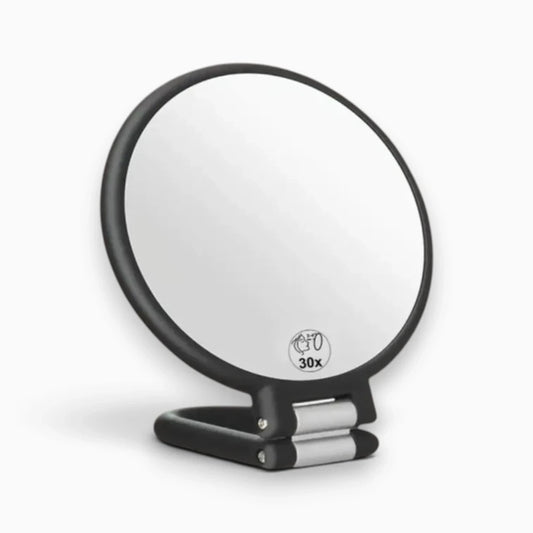 Miroir grossissant de voyage double face sur son support pliable