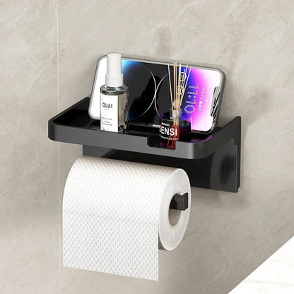 Porte papier toilette noir installé dans une salle de bain