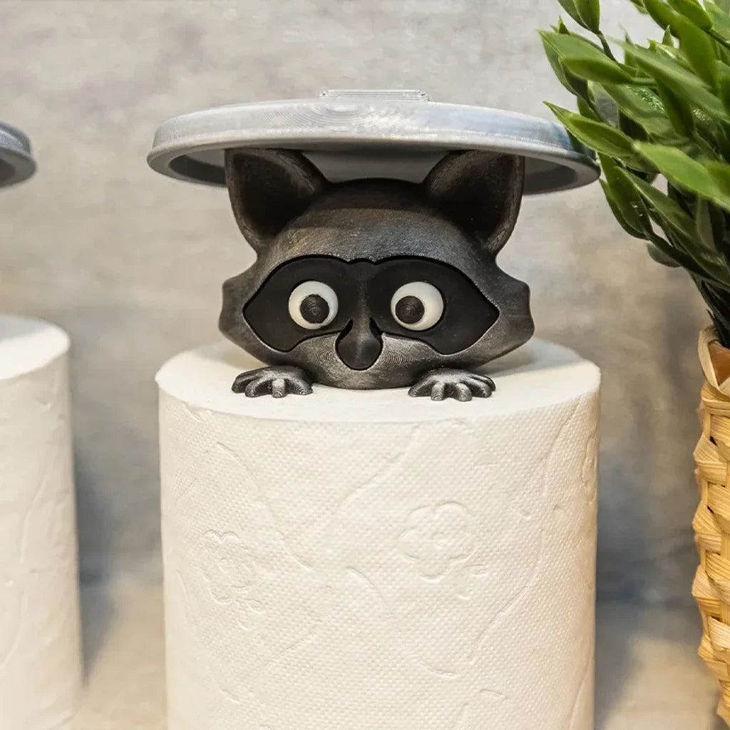 Porte papier toilette rigolo installé dans une salle de bain
