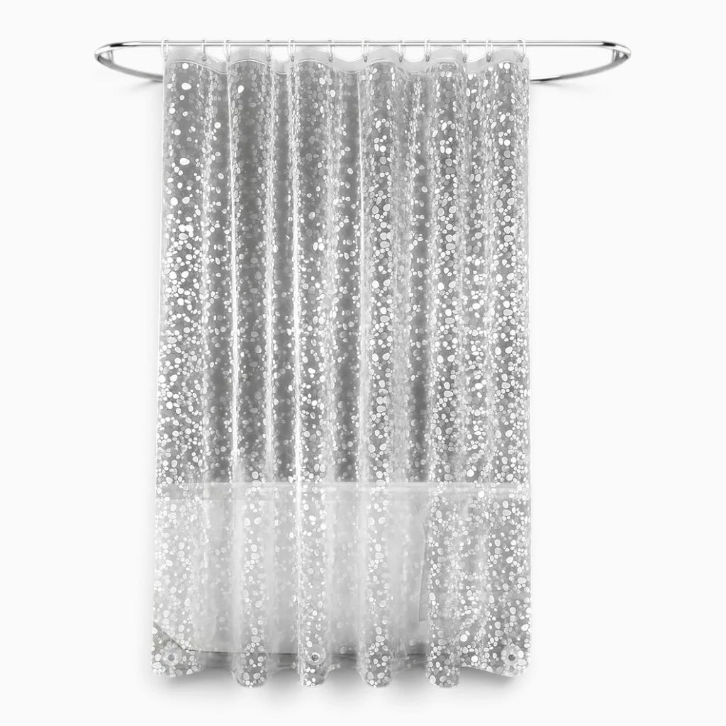Rideau de douche transparent avec base lestée par aimants, installé dans une salle de bain moderne