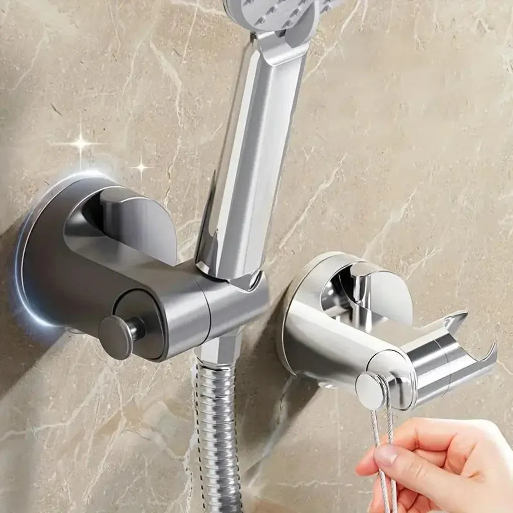 Support de pommeau de douche à ventouse installé dans une salle de bain