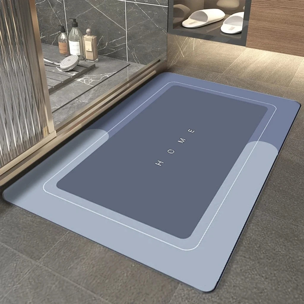 Tapis de bain absorbant diatomite installé dans une salle de bain