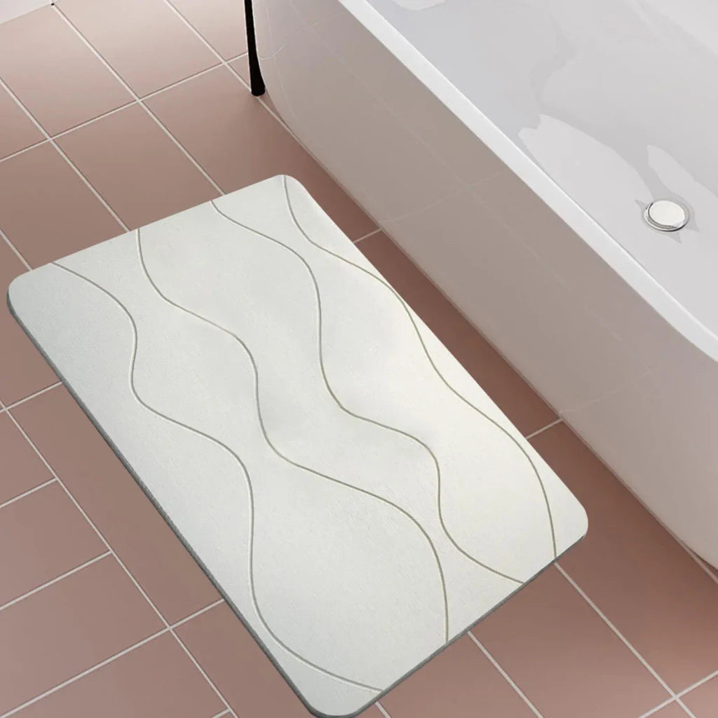Tapis de bain en pierre en situation dans la salle de bain