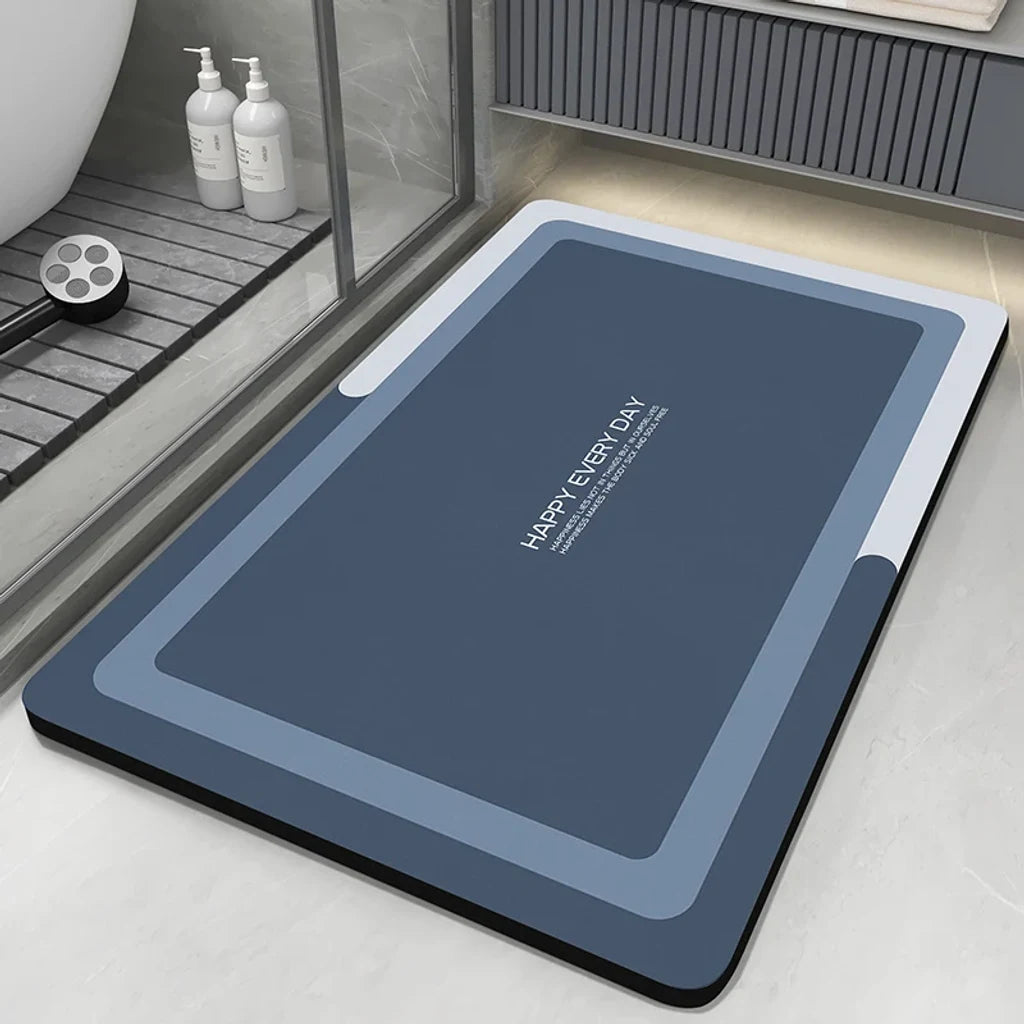 Tapis de bain pierre diatomite installé dans une salle de bain