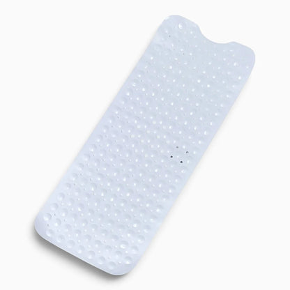 Tapis salle de bain rose en gros plan montrant la texture antidérapante et les trous de drainage