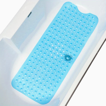 Tapis rose salle de bain étendu au sol, révélant ses ventouses de fixation robustes