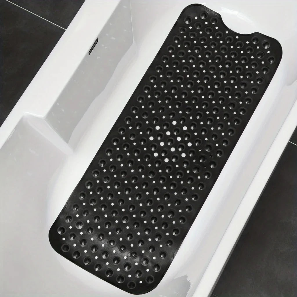 Tapis de bain rose en situation dans la salle de bain